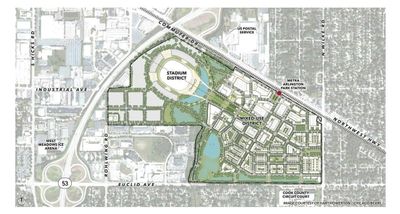 A detailed overhead map of a planned development including a stadium, residential areas, and roadways.