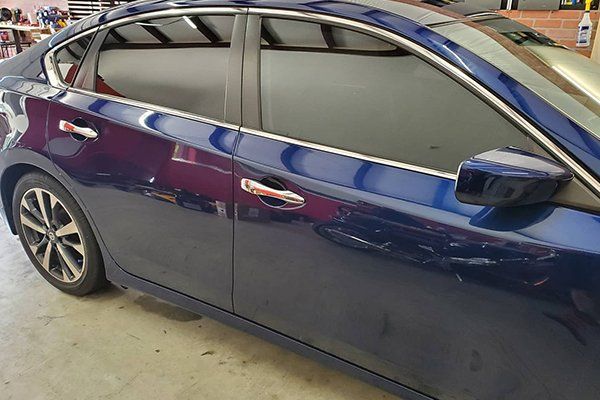Blue Sedan with Carbon Tinted Windows — Converse, TX — Quality Master Auto Glass