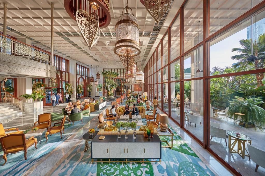 An artist 's impression of the lobby of a hotel.