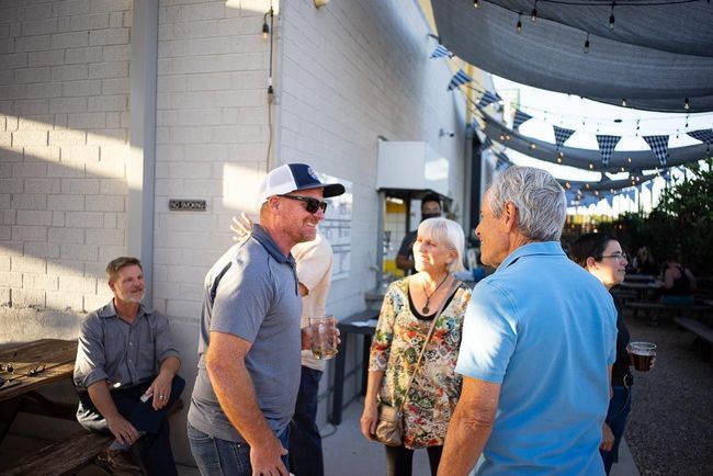 Jay Bramble head of sales talks to Lighthouse Customers at an open house event at the brewtorium in Austin Texas. 