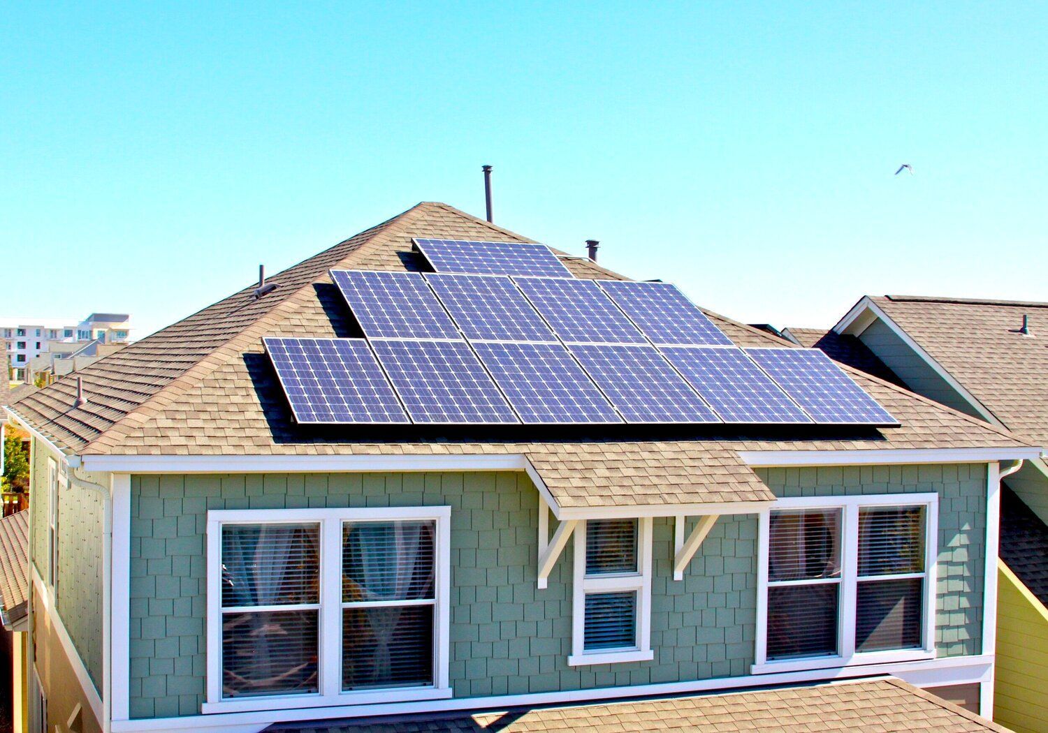 Picture of Bungalow with Solar Sytem in Austin Texas that helps Reduce Carbon Footprint for Eco-Friendly Energy Solutions