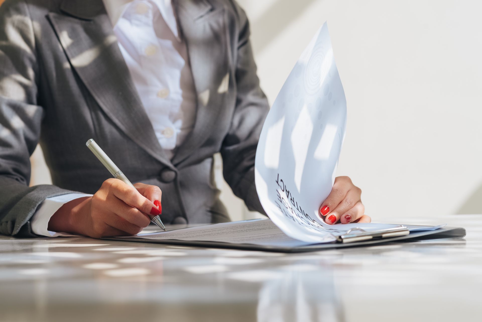 American woman lawyer or businesswoman African working with laptop, searching, analyzing data, reading contract documents work with law books hammer of justice Consulting lawyer concept.