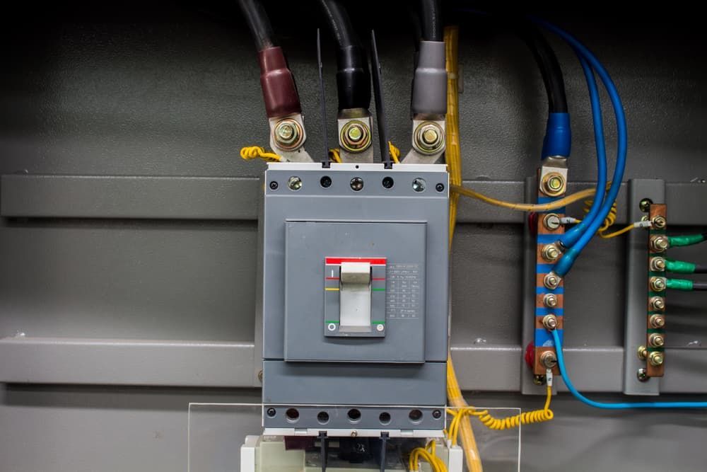 A Close Up of an Electrical Box With a Breaker and Wires — SEP Electrical Pty Ltd in Towradgi, NSW
