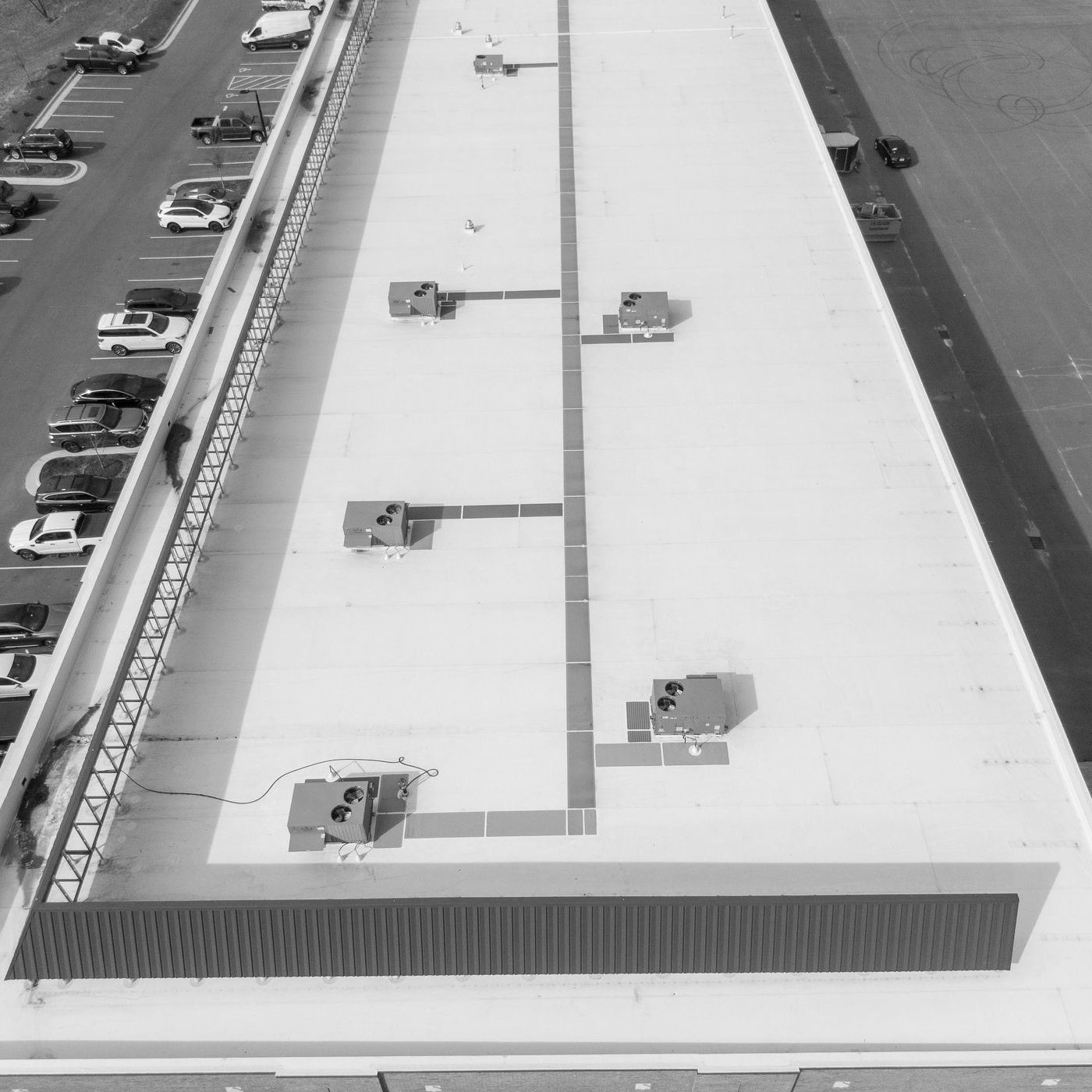 Photo of a flat white commercial roof