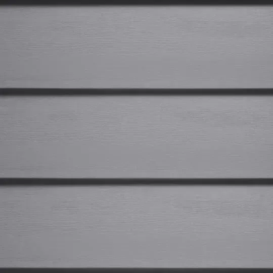 A close up of a gray siding on a house.