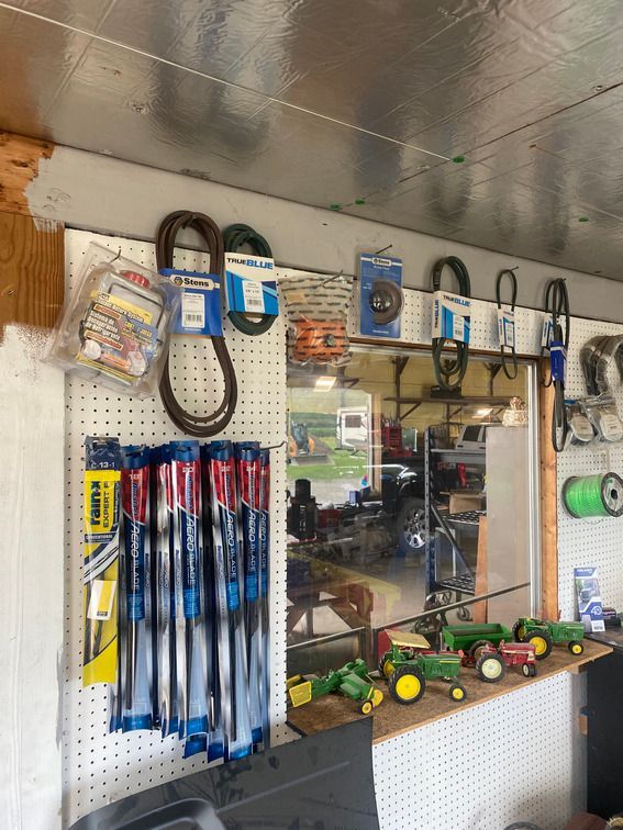 A garage filled with lots of tools and toys.