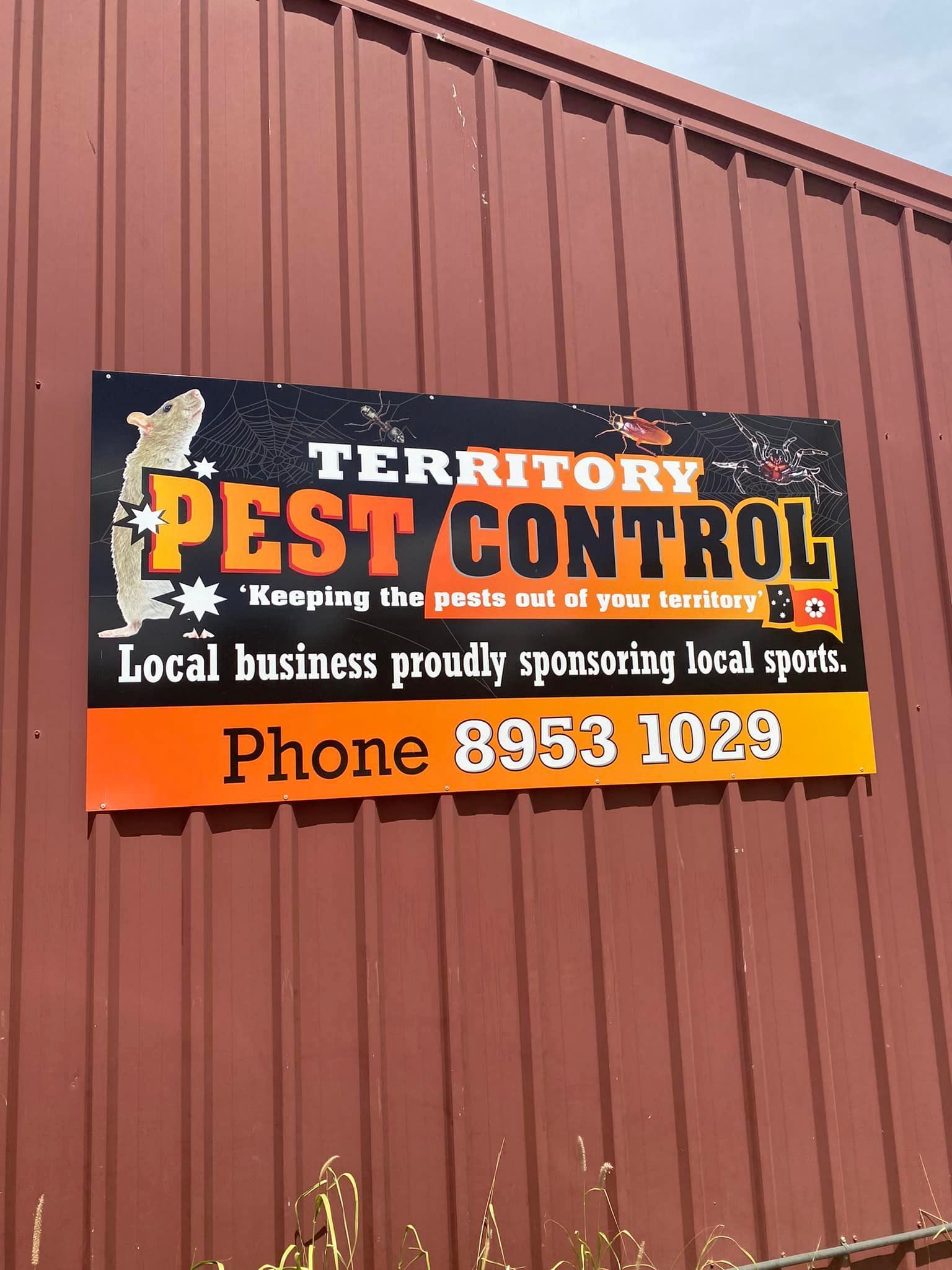 A Container Van With Territory Pest Control Banner