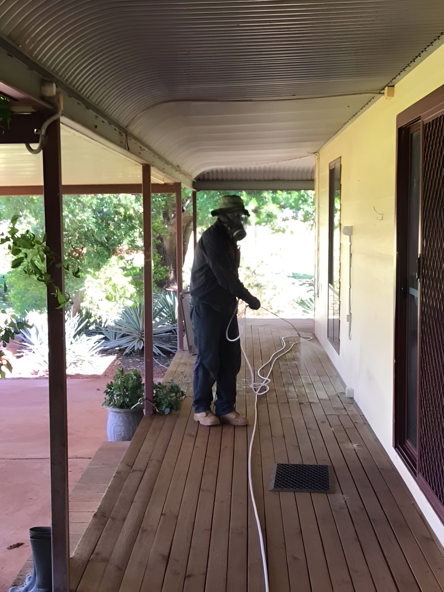 Person Practicing Eco Friendly Pest Control