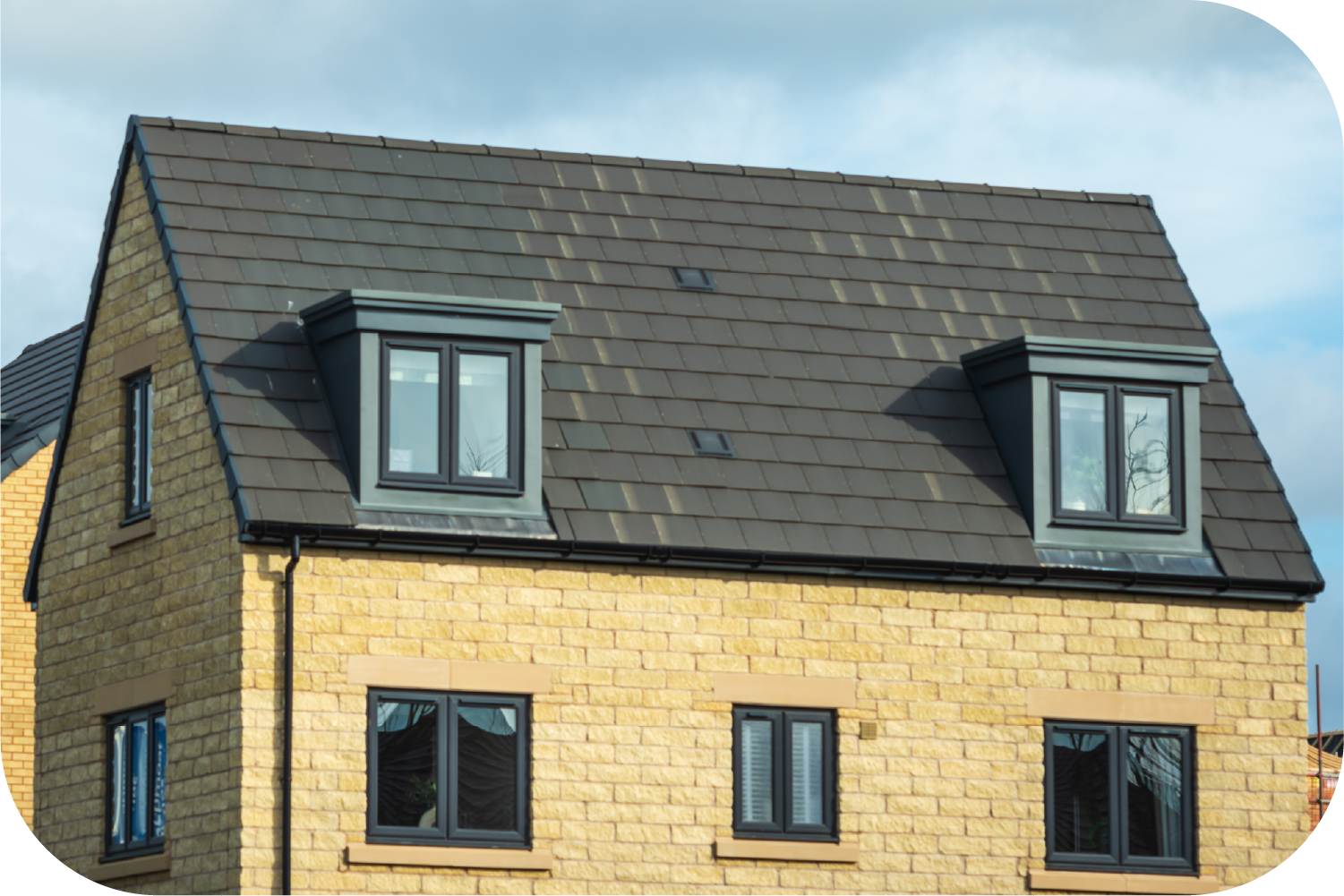 An attic with a pipe covered in aluminum foil