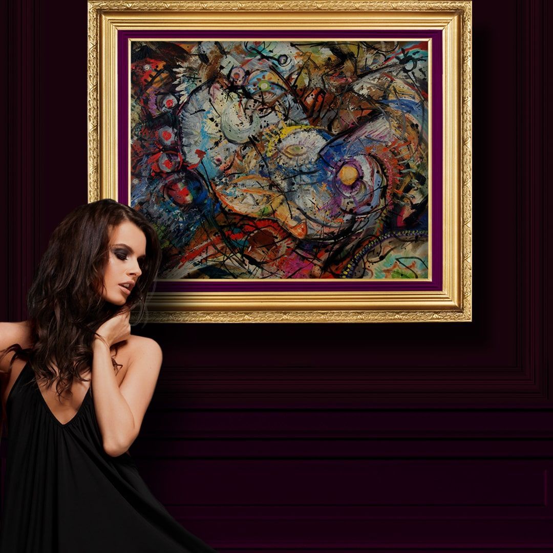 Beautiful woman standing in front of abstract oil painting titled 