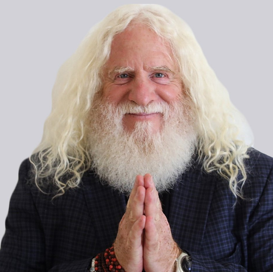 A man with long blonde hair and a beard is praying