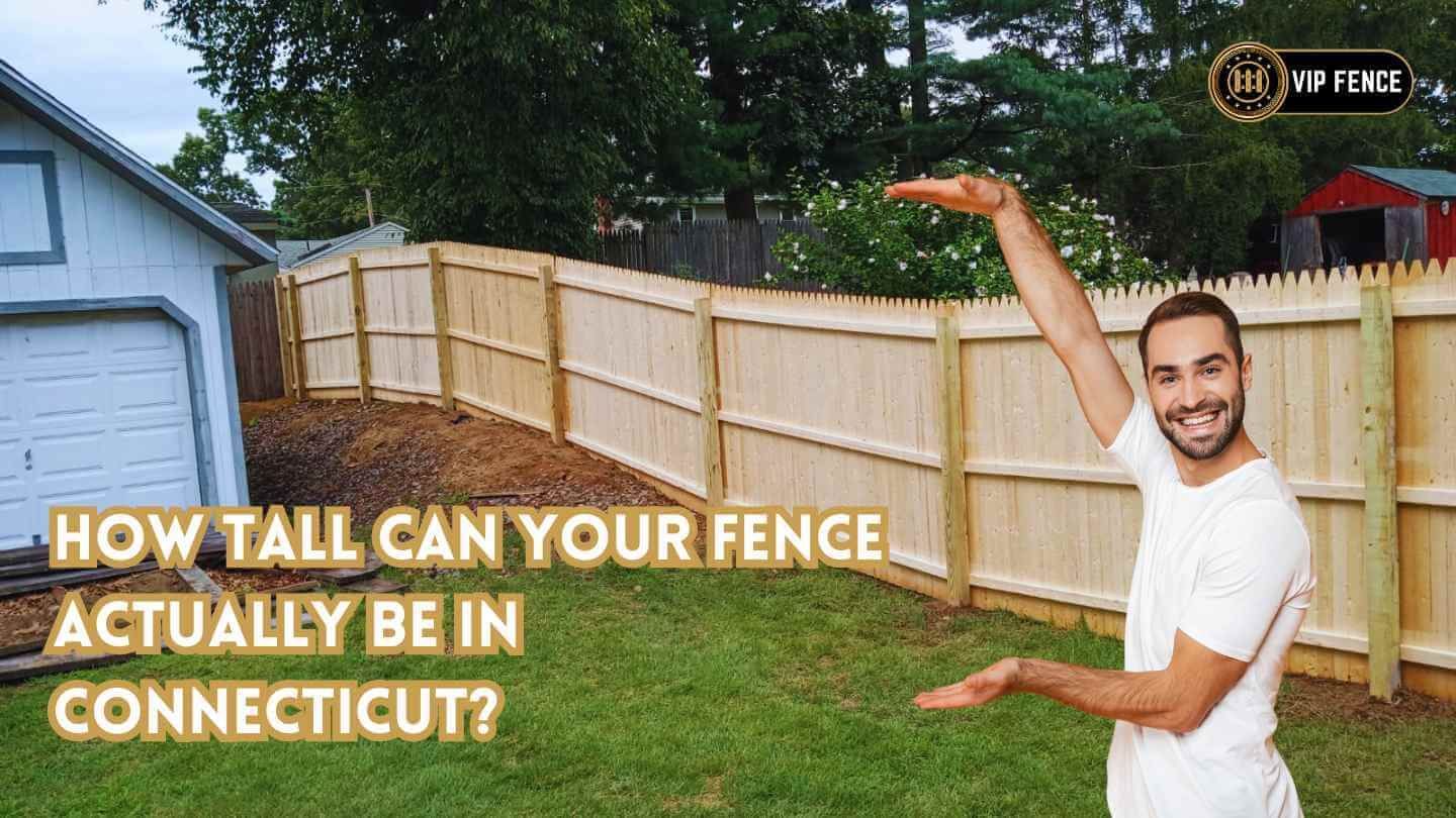 A man is standing in front of a wooden fence in connecticut.