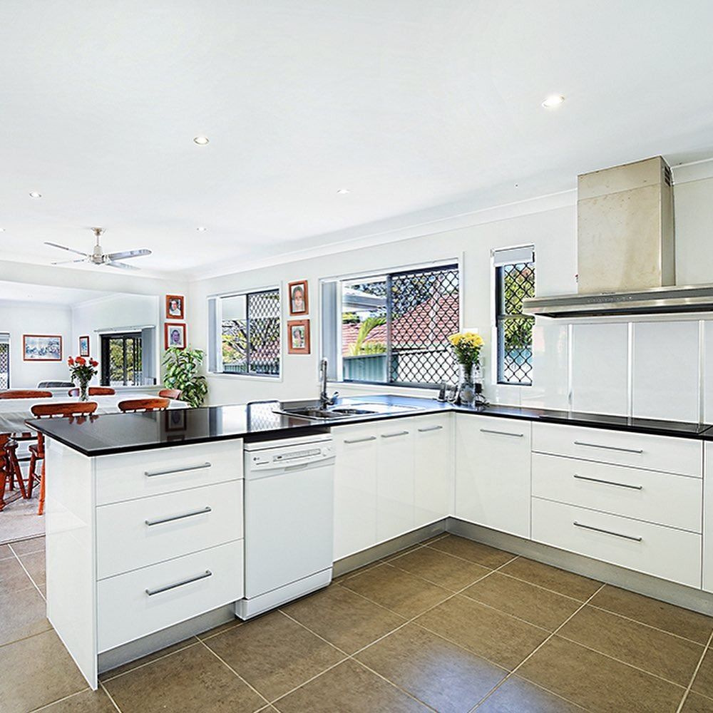 Modern Kitchen With White Cabinets