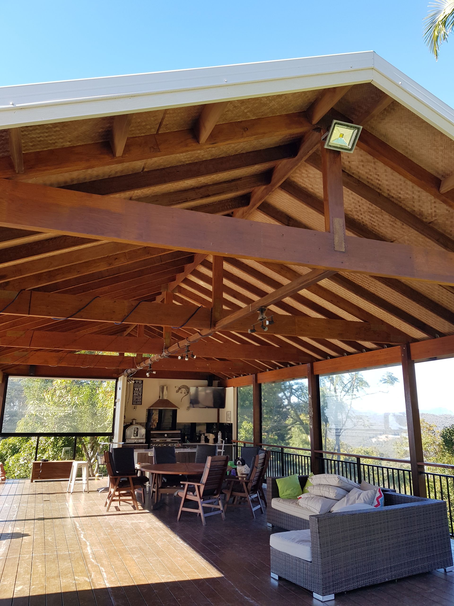 A Room With A Table And Chairs And A Ceiling Fan — Scott Graham Building Services In Bilambil Heights, NSW 
