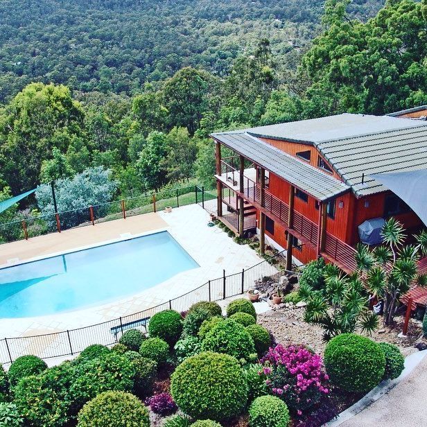 An Aerial View Of A House With A Swimming Pool — Scott Graham Building Services In Mermaid Beach, QLD