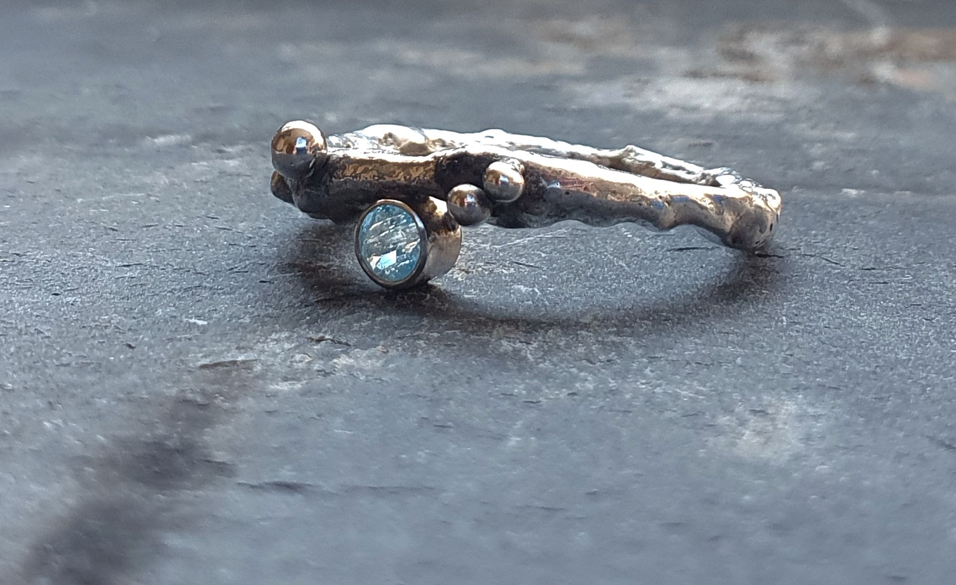 Ring with blue topaz