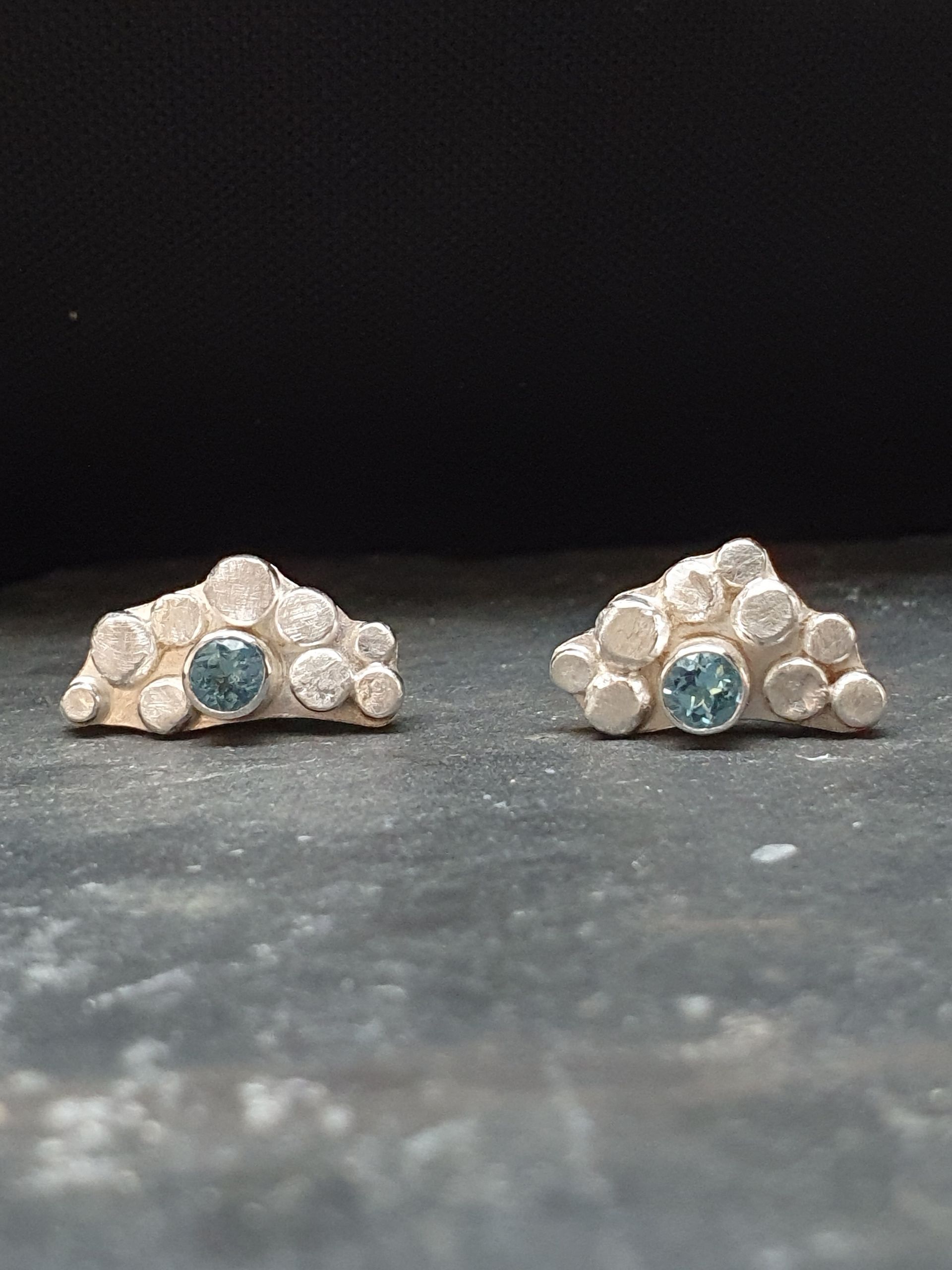 Earrings with blue topaz