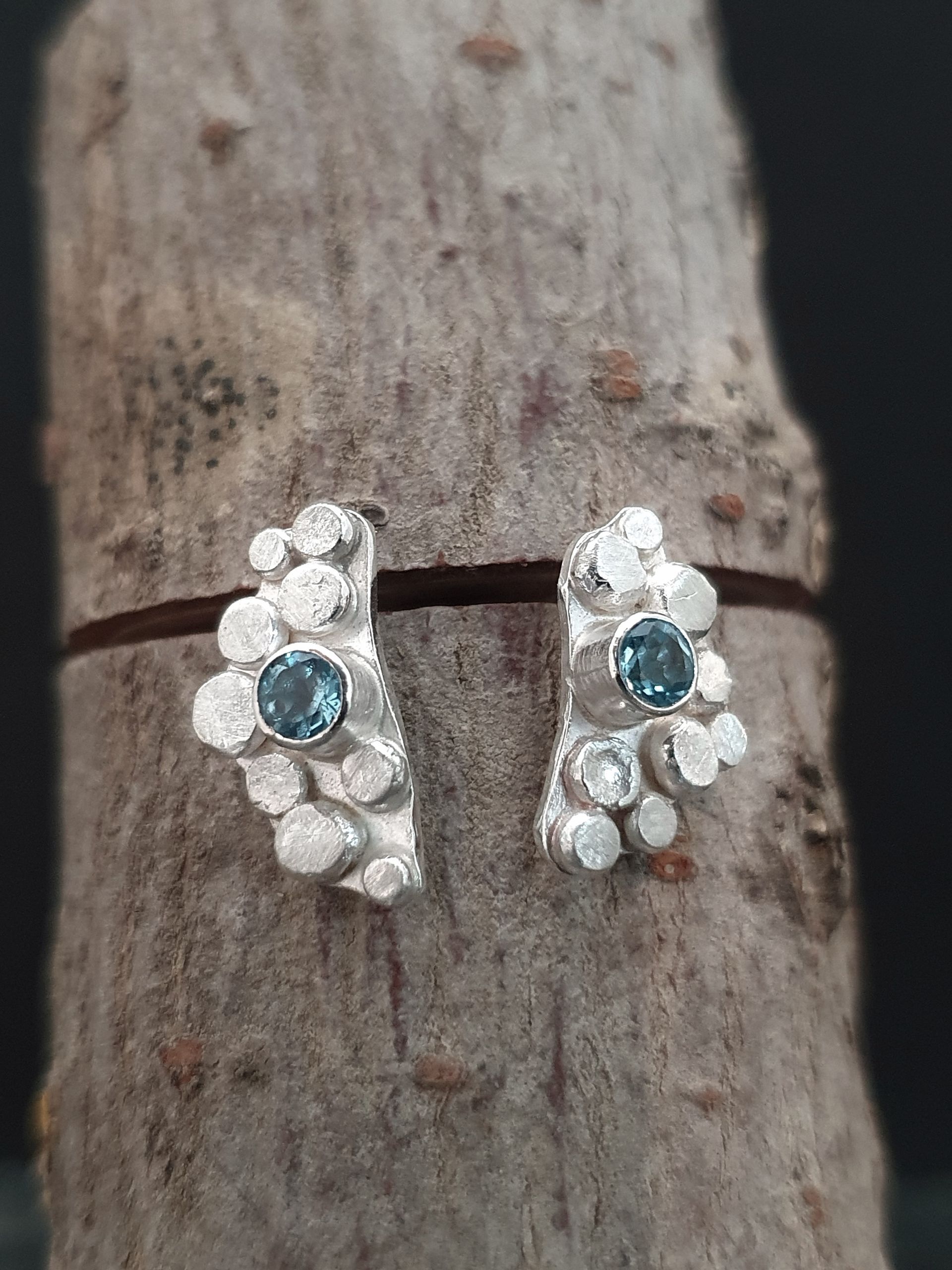 Earrings with blue topaz