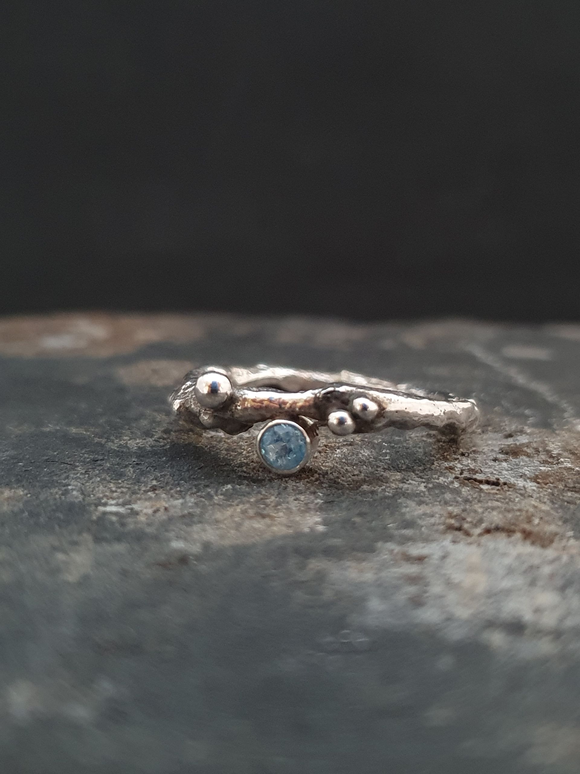 Ring with blue topaz