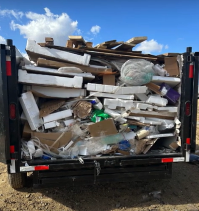 Anchorage Junk Removal trailer filled with junk and debris from a job.