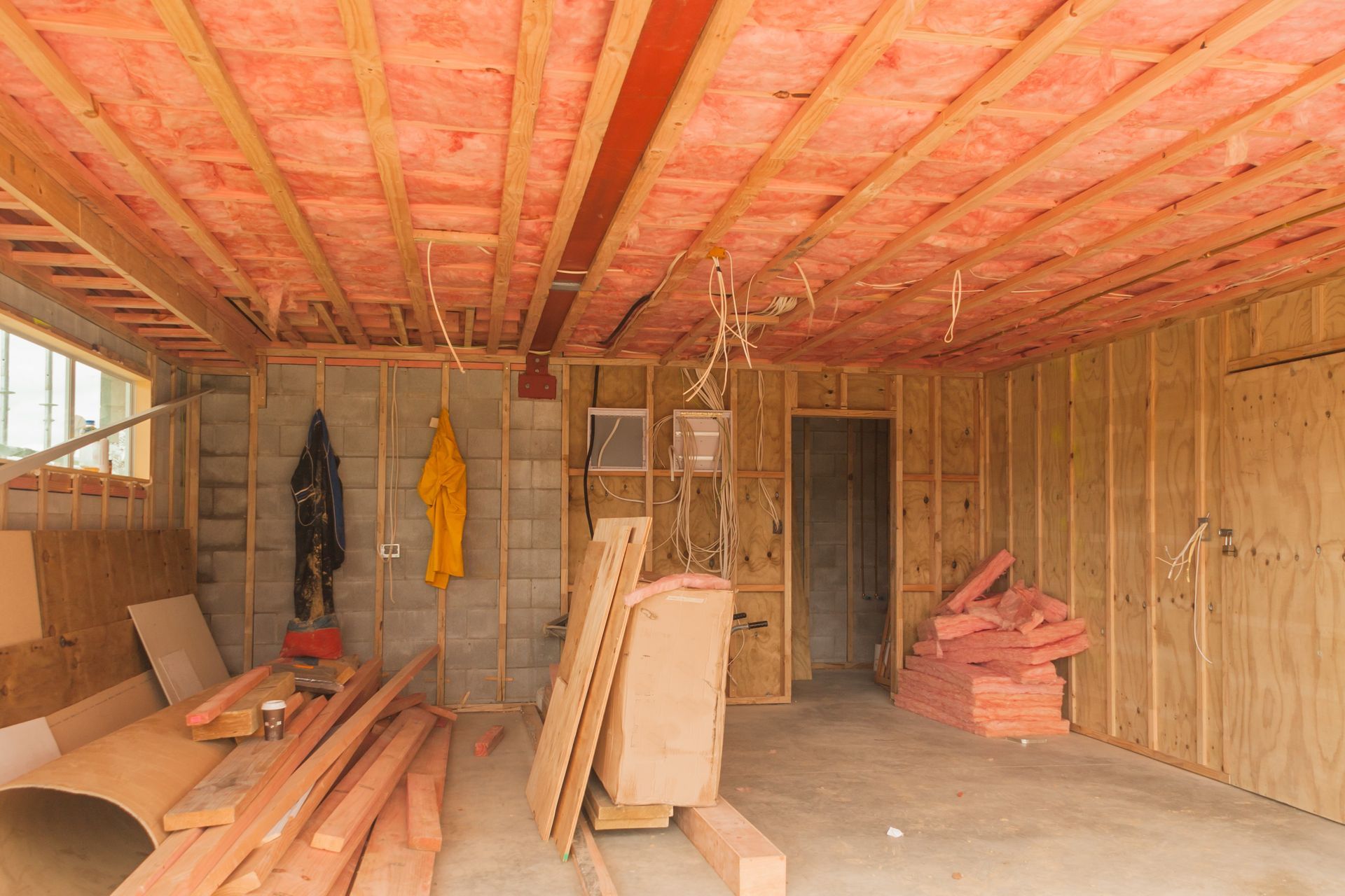 An insulation of a ceiling in garage construction.