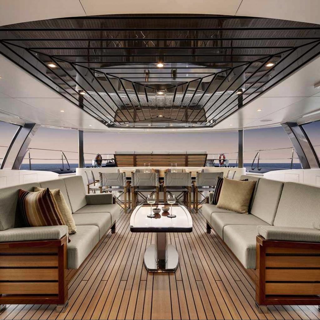 the inside of a yacht with lots of furniture and a table