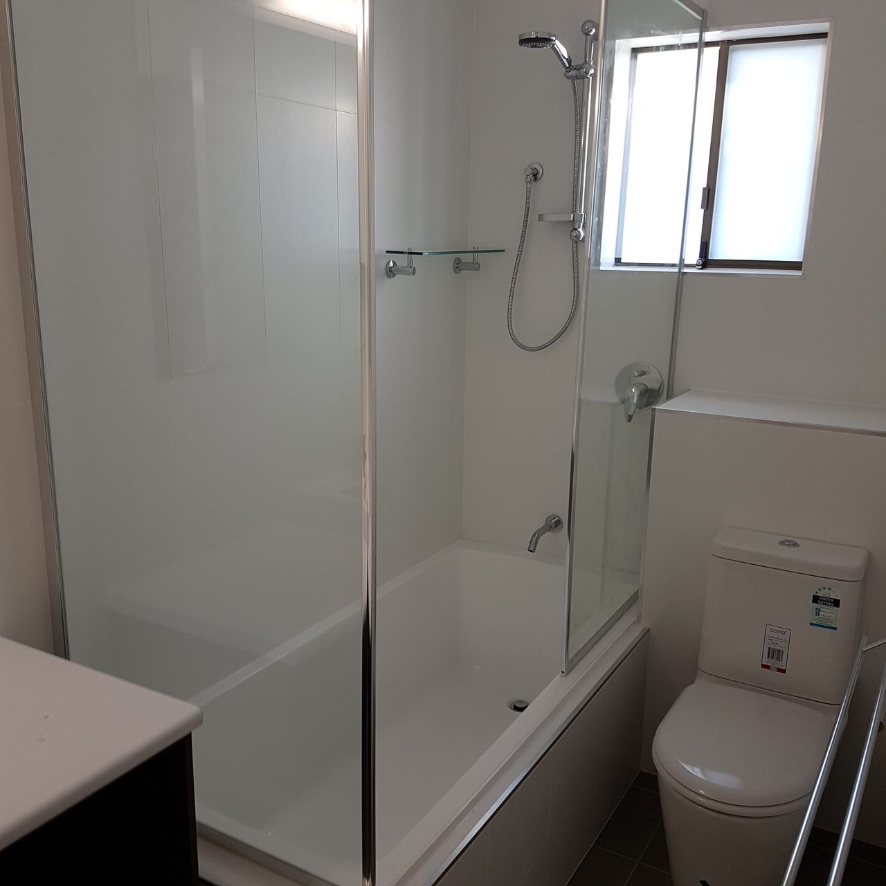 A Bathroom With A Toilet A Bathtub And A Shower — Damn Fine Constructions In Bonville, NSW