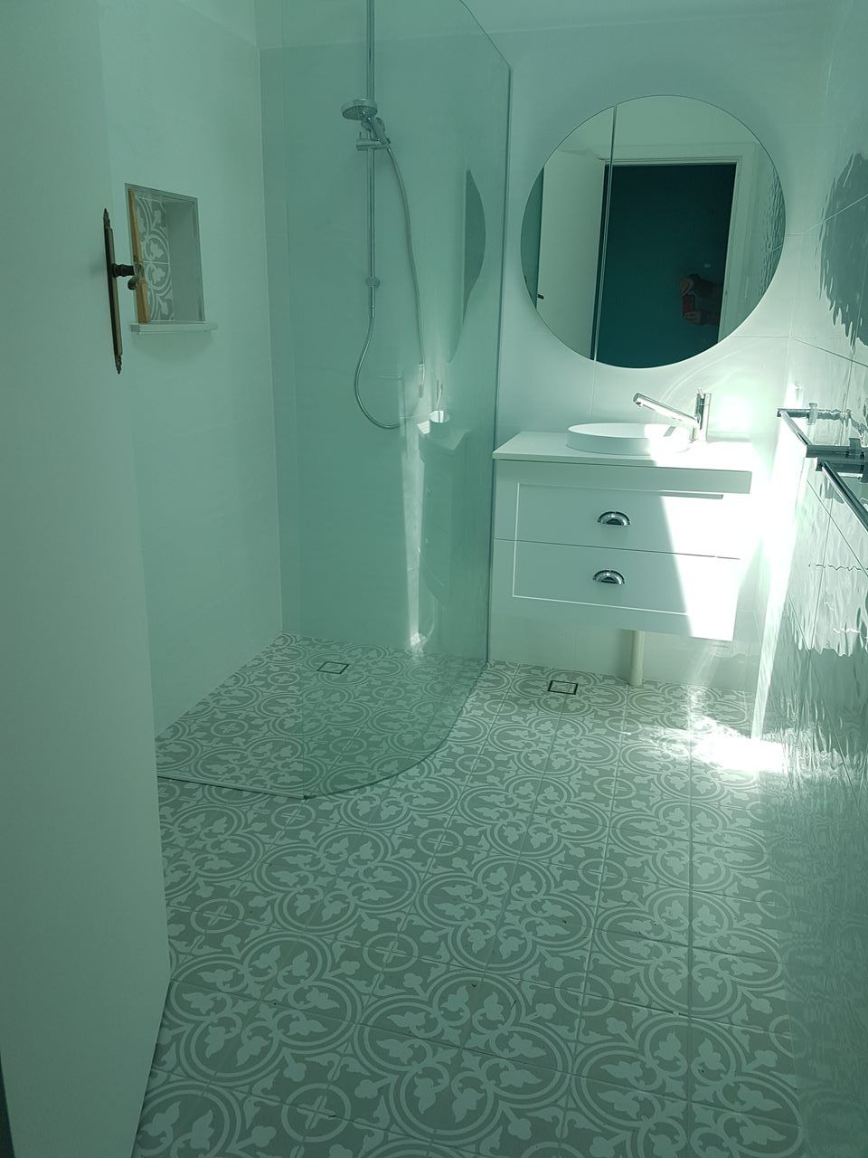 A Bathroom With A Sink, Shower And Mirror — Damn Fine Constructions In Bonville, NSW