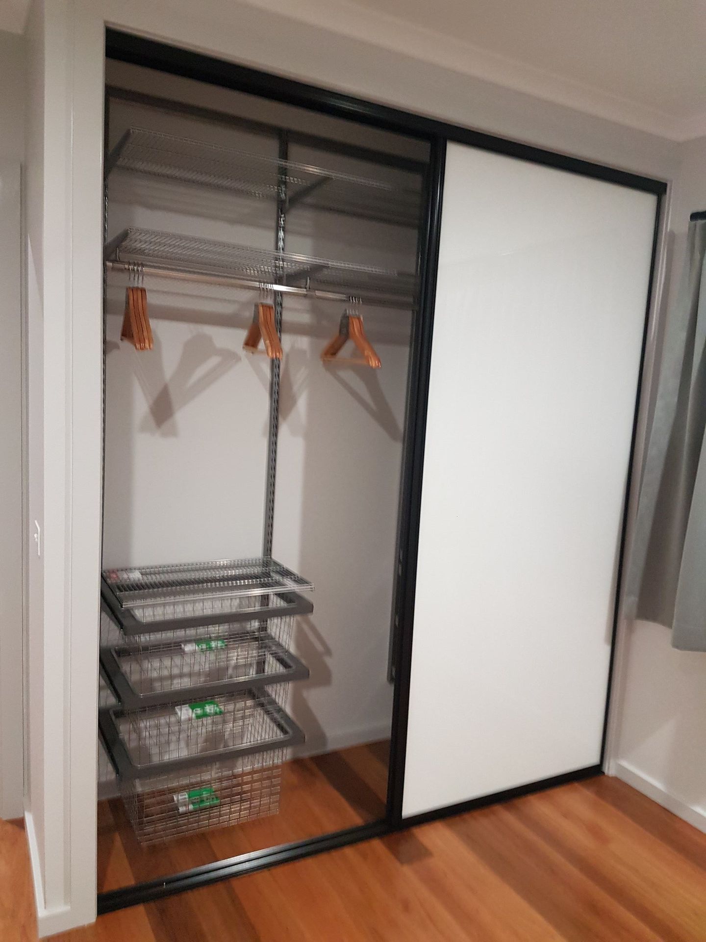 A Man Is Cutting A Piece Of Wood With A Plane — Damn Fine Constructions In Bonville, NSW