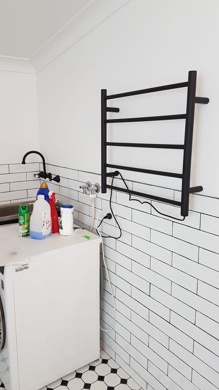 A Laundry Room With A Washing Machine And A Towel Rack — Damn Fine Constructions In Bonville, NSW