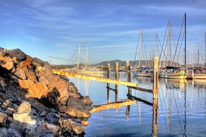 Boats Are Docked In A Marina In Coffs Harbour — Damn Fine Constructions In Coffs Harbour, NSW