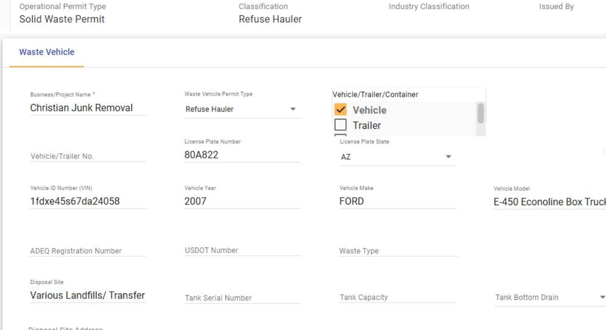 Online form with fields for vehicle information, including a dropdown menu with 