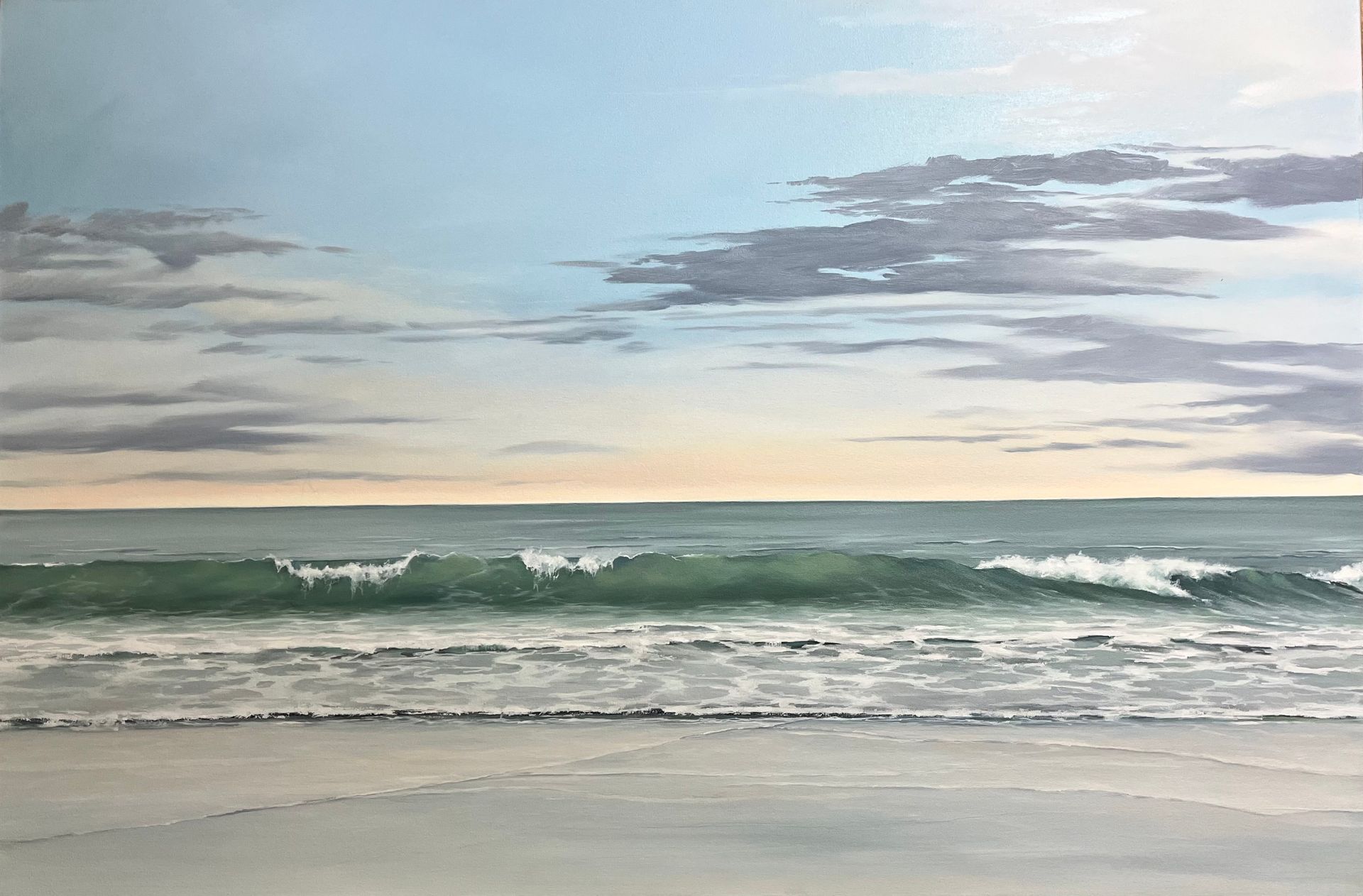 A realistic oil painting of a calm beach scene with a gentle wave rolling onto light sand under a soft, cloudy blue sky.
