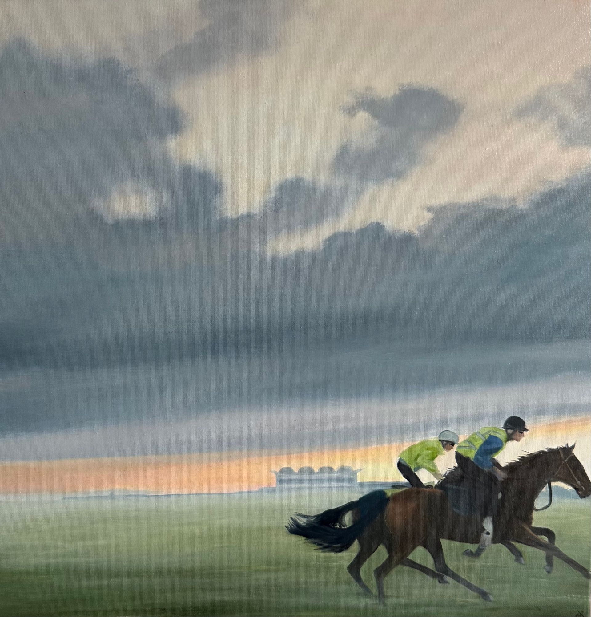 Two horses with jockeys race on a green field under a cloudy sky.