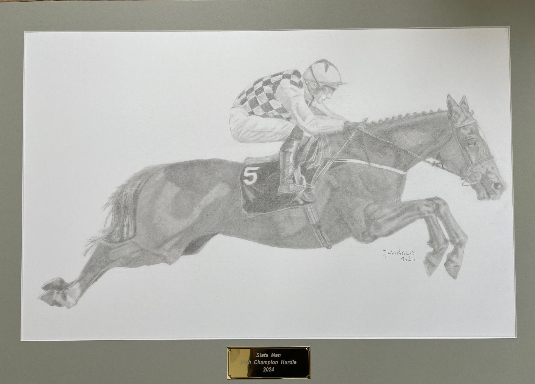 Pencil drawing of a racehorse jumping a hurdle. Jockey in checkered silks. Horse wearing number 5.