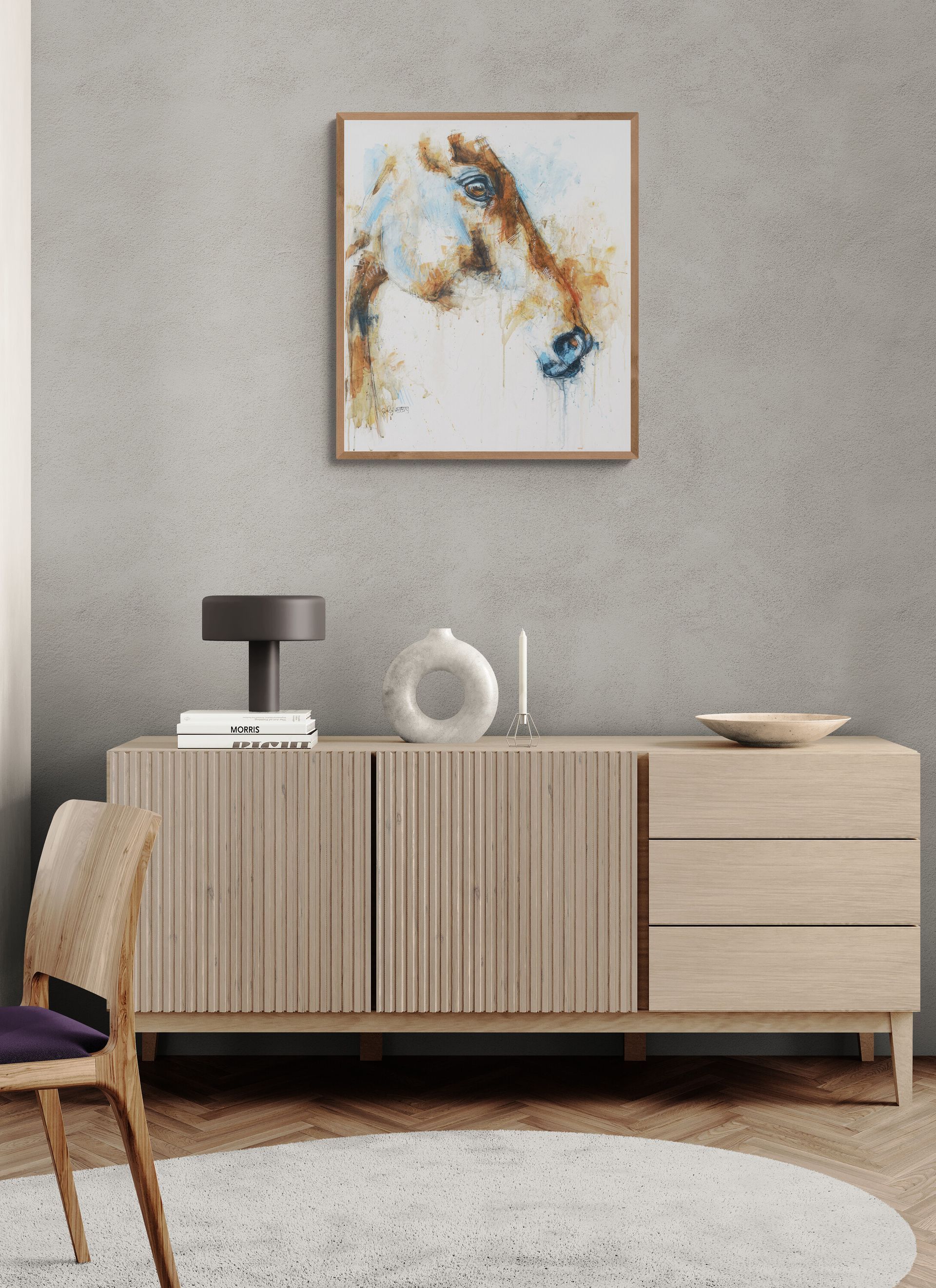 A living room with a wooden dresser and a painting on the wall.