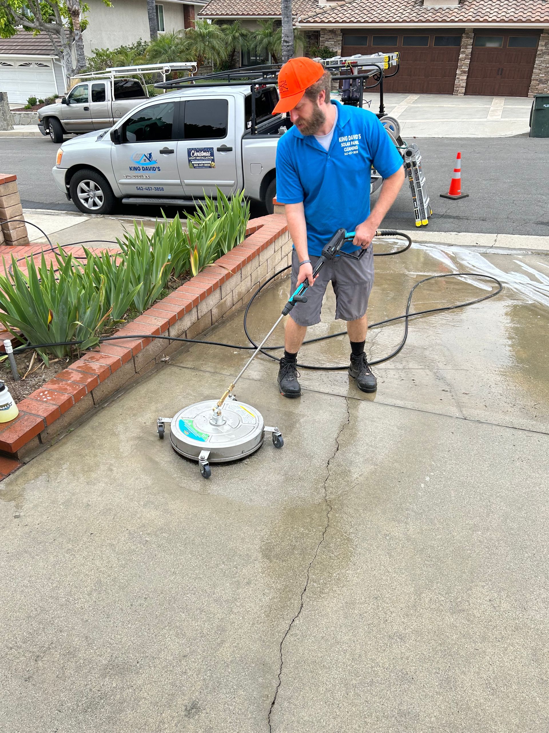 A man is taking a picture of his reflection in a skylight.