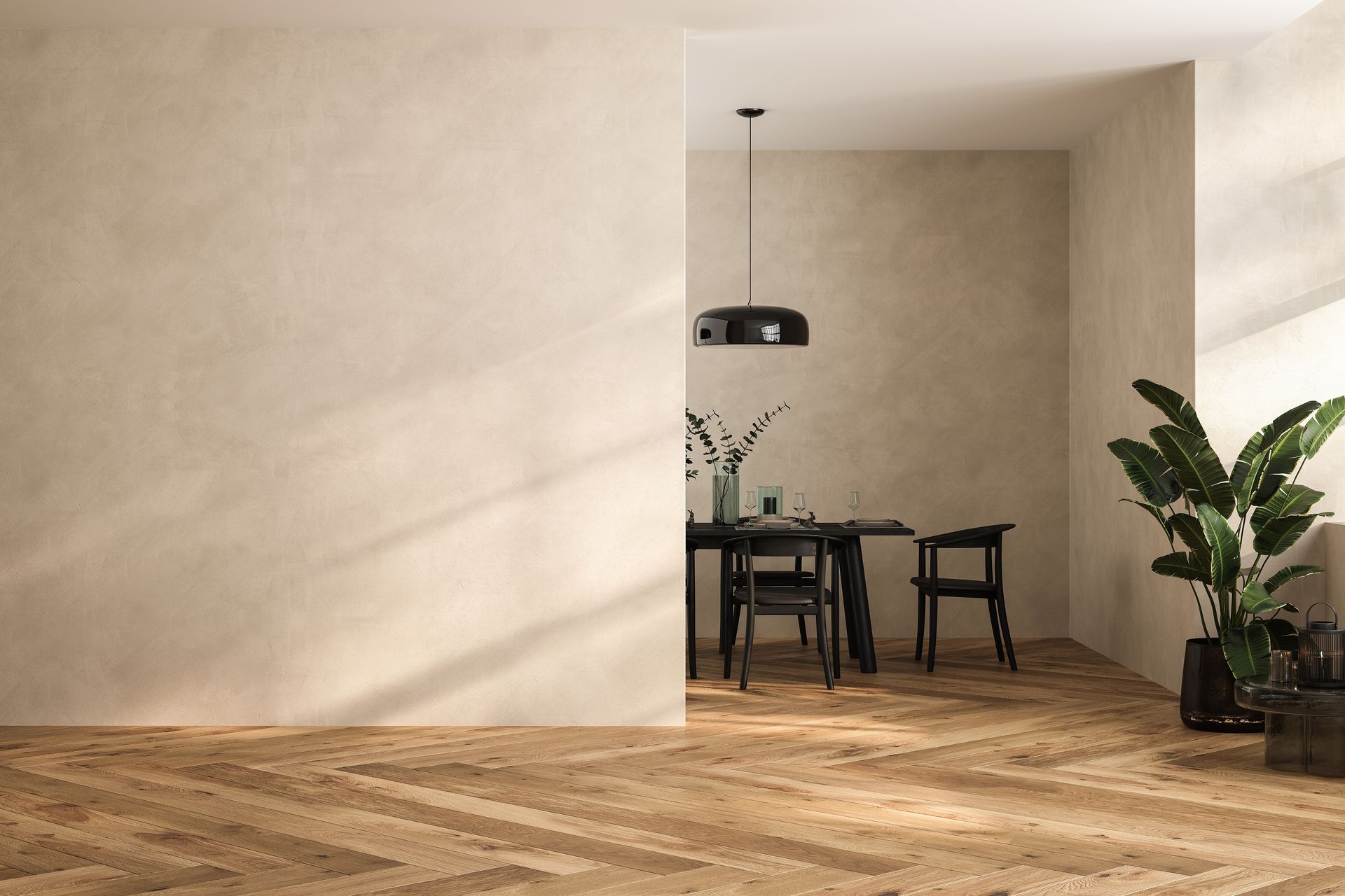A dining room with a table and chairs and a plant.