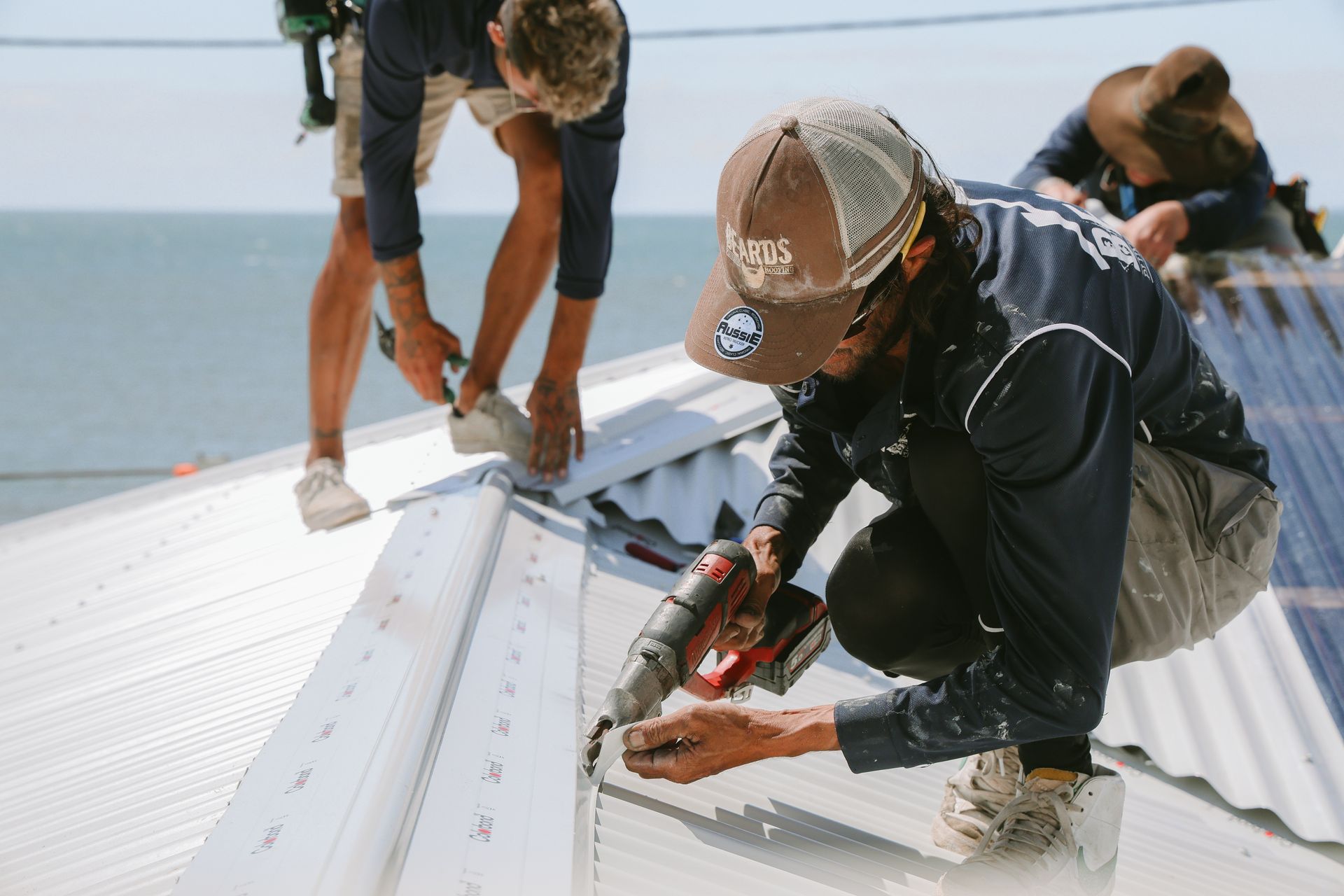 A Close Up Of Colorbond Roofing Being Installed — Beards Roofing and Plumbing in Logan, QLD