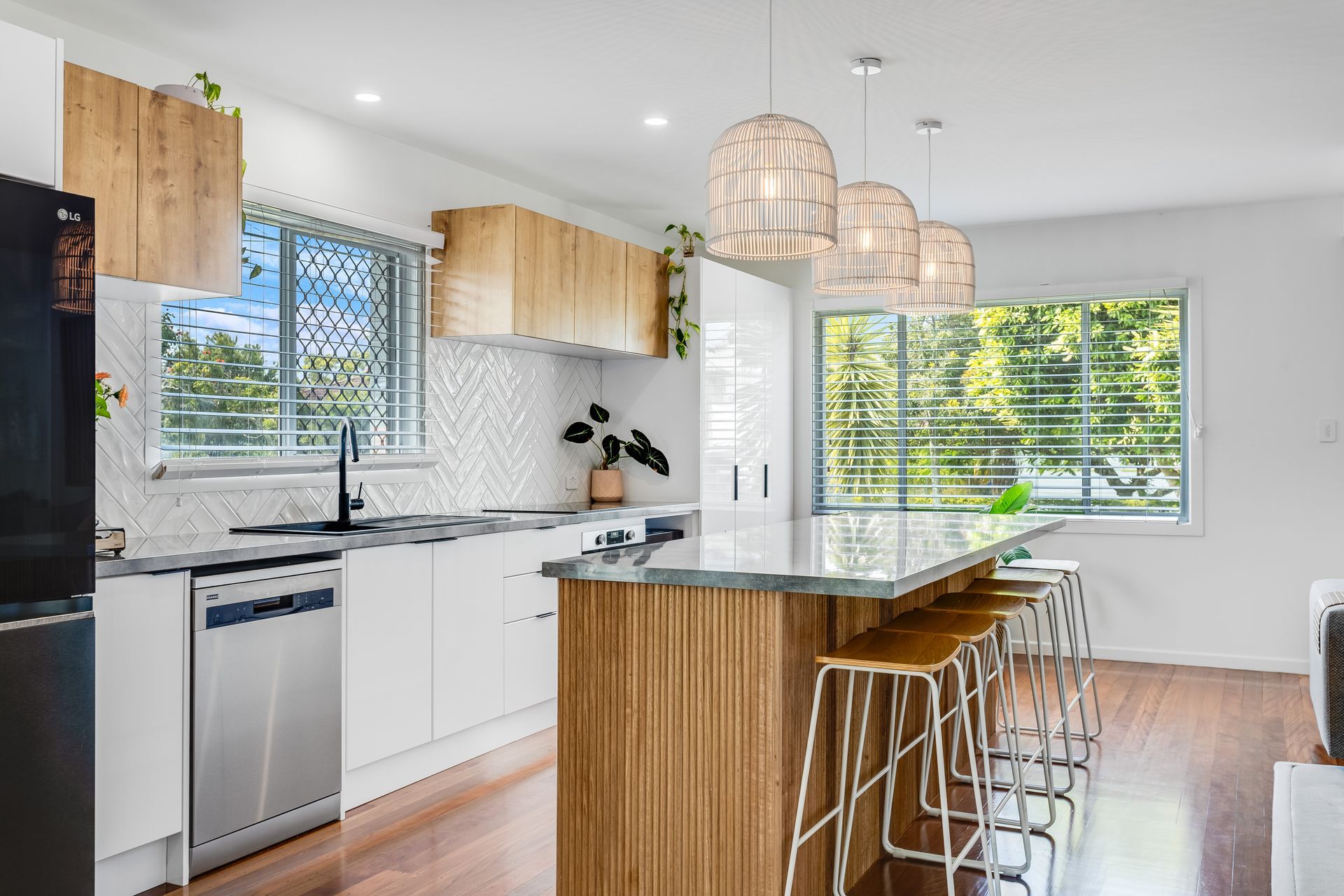 Kitchen With Stainless Steel Appliances — Beards Roofing and Plumbing in Clontarf, QLD 