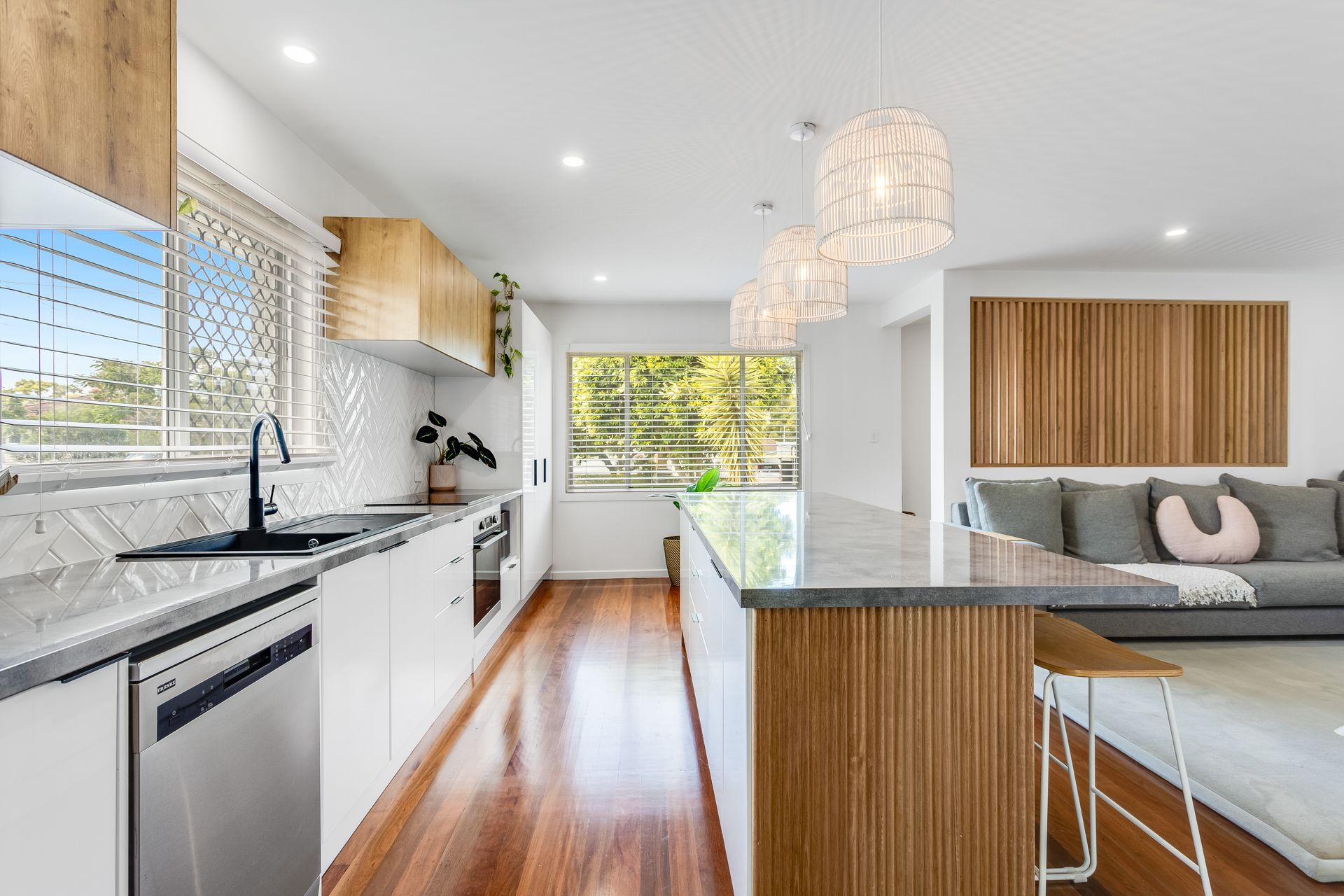 Kitchen With White Cabinets — Beards Roofing and Plumbing in Clontarf, QLD