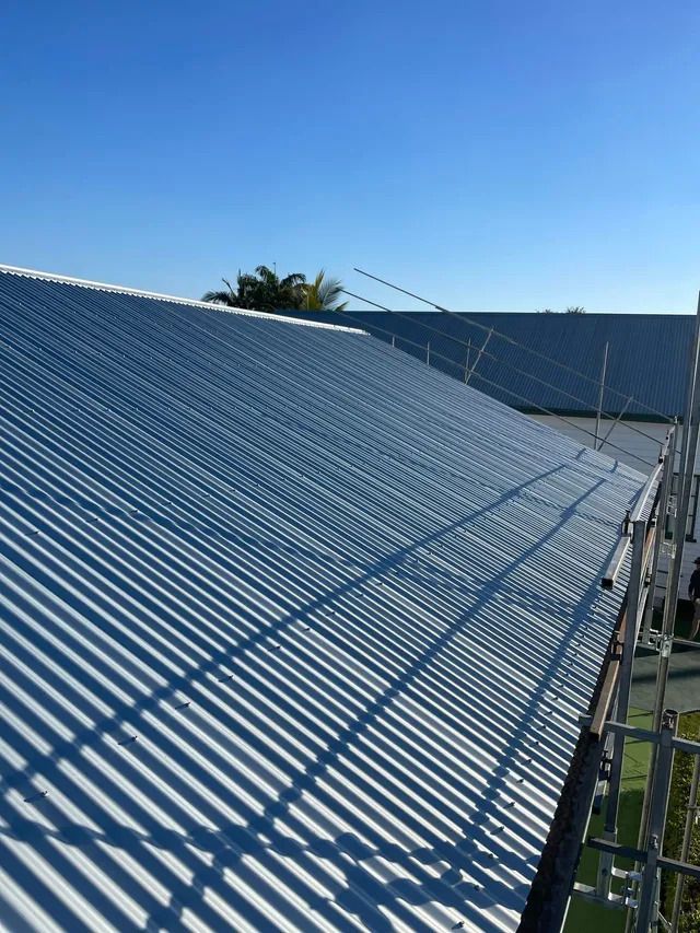 White Roof With a Blue Sky in the Background — Beards Roofing and Plumbing in Clontarf, QLD