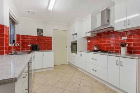 red tiled kitchen