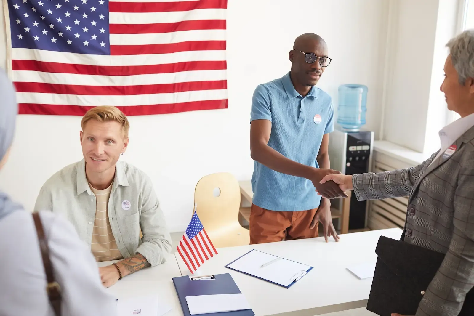 Workers registering voters at polling station