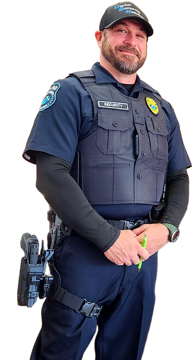 A police officer is standing in front of a white background.
