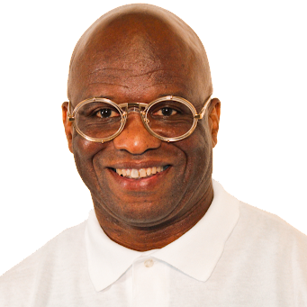 A bald man wearing glasses and a white shirt smiles