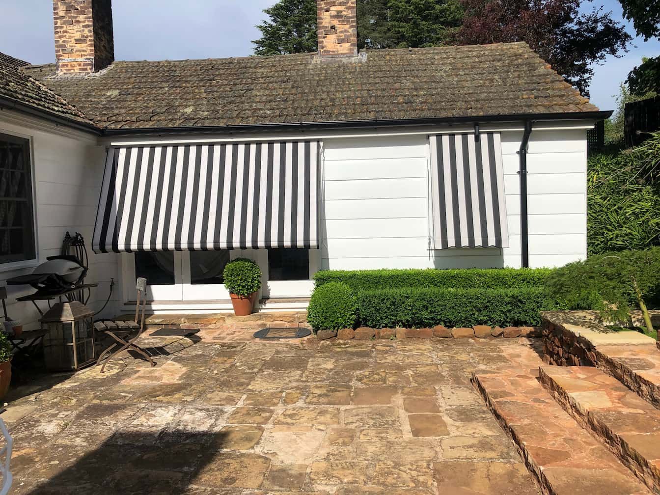 Window Awning Black and White Lines — Window Coverings in Exeter, NSW