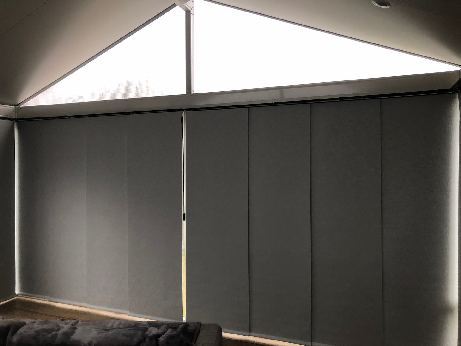Gray Blinds On A Triangular Window — Window Coverings in Exeter, NSW