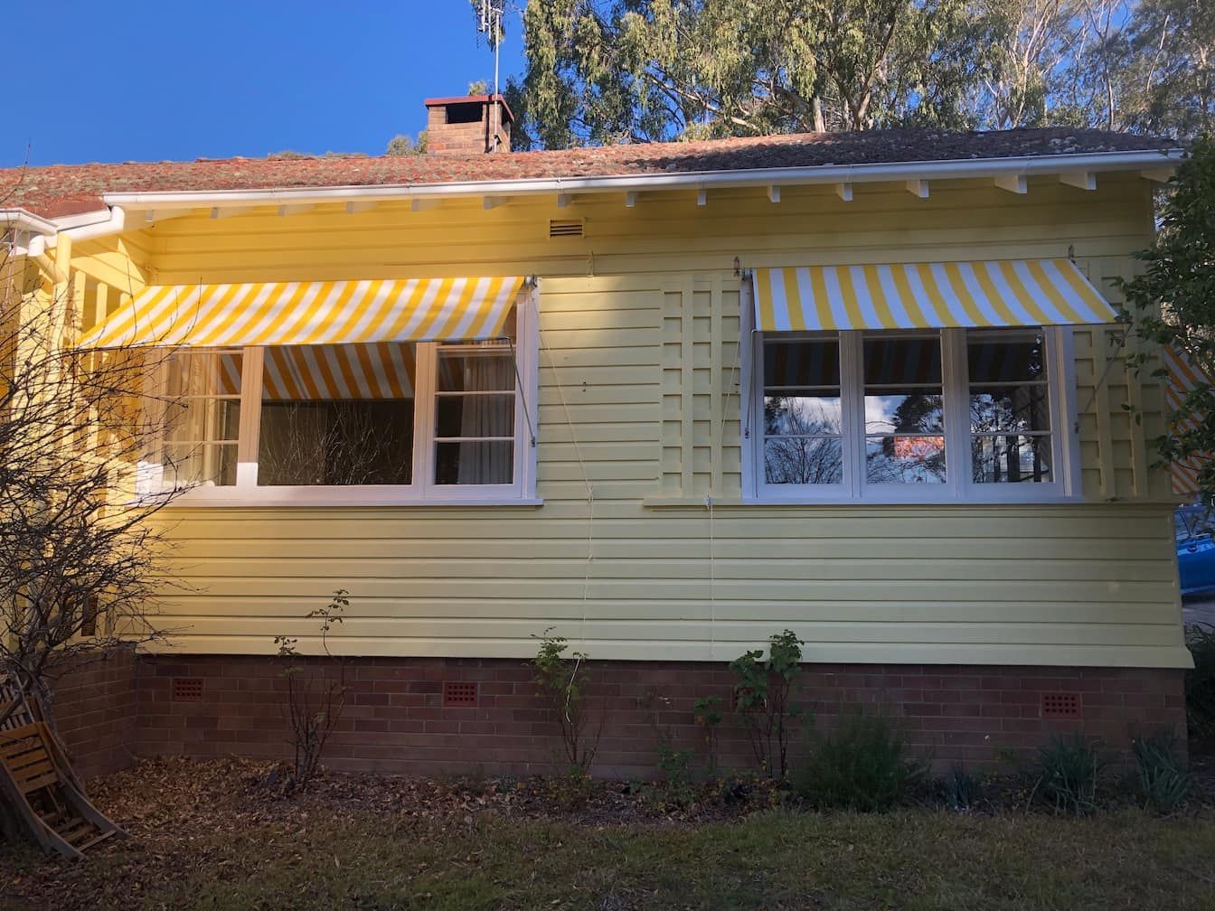 Striped Awnings On Two Windows — Window Coverings in Exeter, NSW