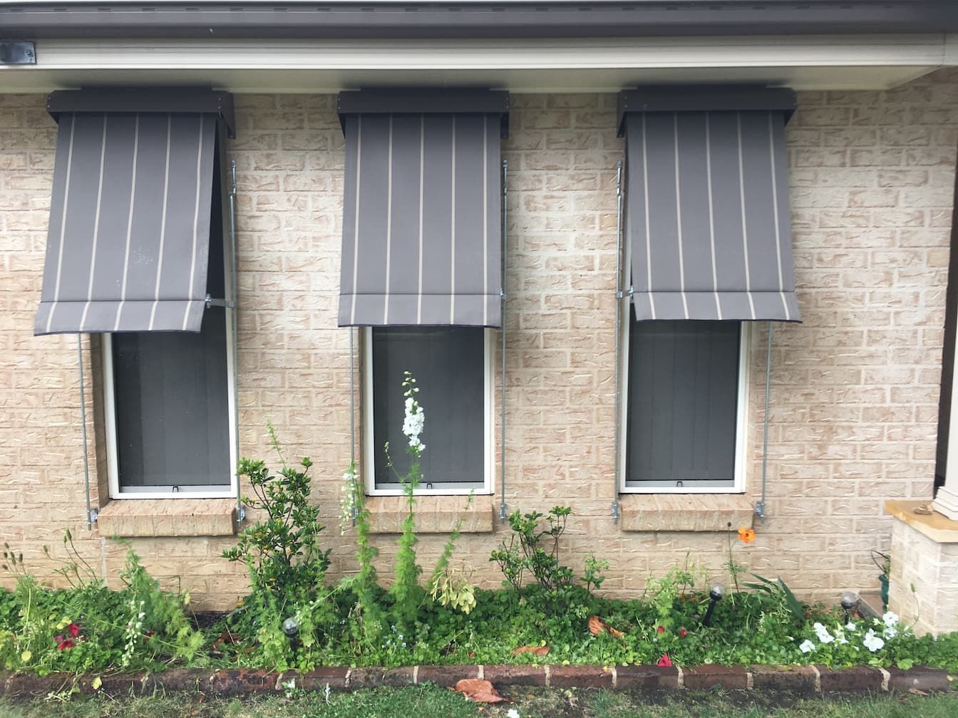 Gray Striped Awnings On Three Windows — Window Coverings in Exeter, NSW